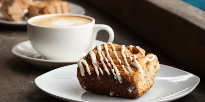 close-up of coffee and dessert