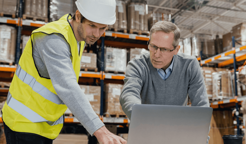 men-warehouse-working-laptop men-warehouse-working-laptop