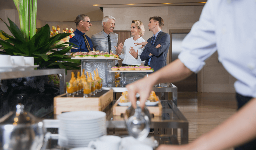 cheerful-business-people-talking-buffet cheerful-business-people-talking-buffet